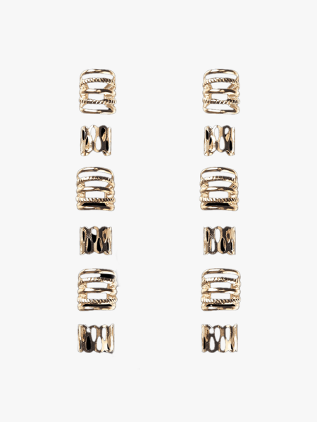 Image may contain: Accessories, Earring, and Jewelry